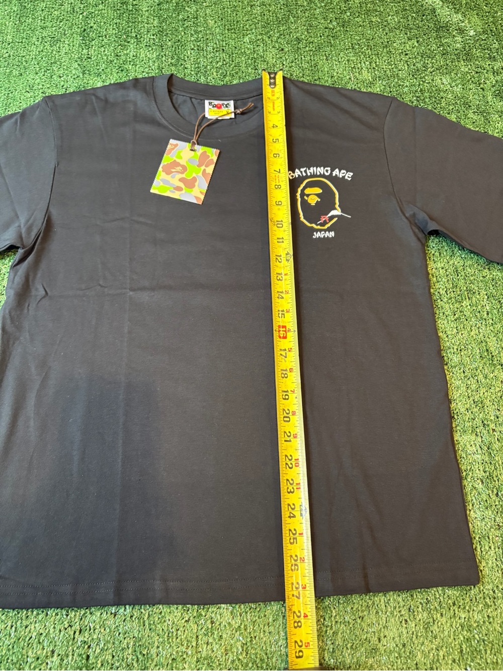 Bape Black Short-Sleeve Tee with Small Yellow Ape Head Chest Logo - Picture 5 of 9